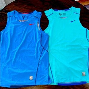 2 Nike Pro Combat Sleeveless Shirts. Like New. Size Large fitted.